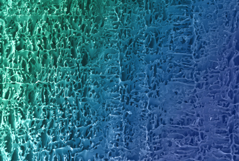 A micro fiber like image of rectangular section shaded starting with cyan from the left merging to blue on the right