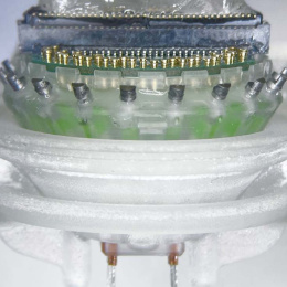 circular layers of electrodes, plastic, metal, and wires